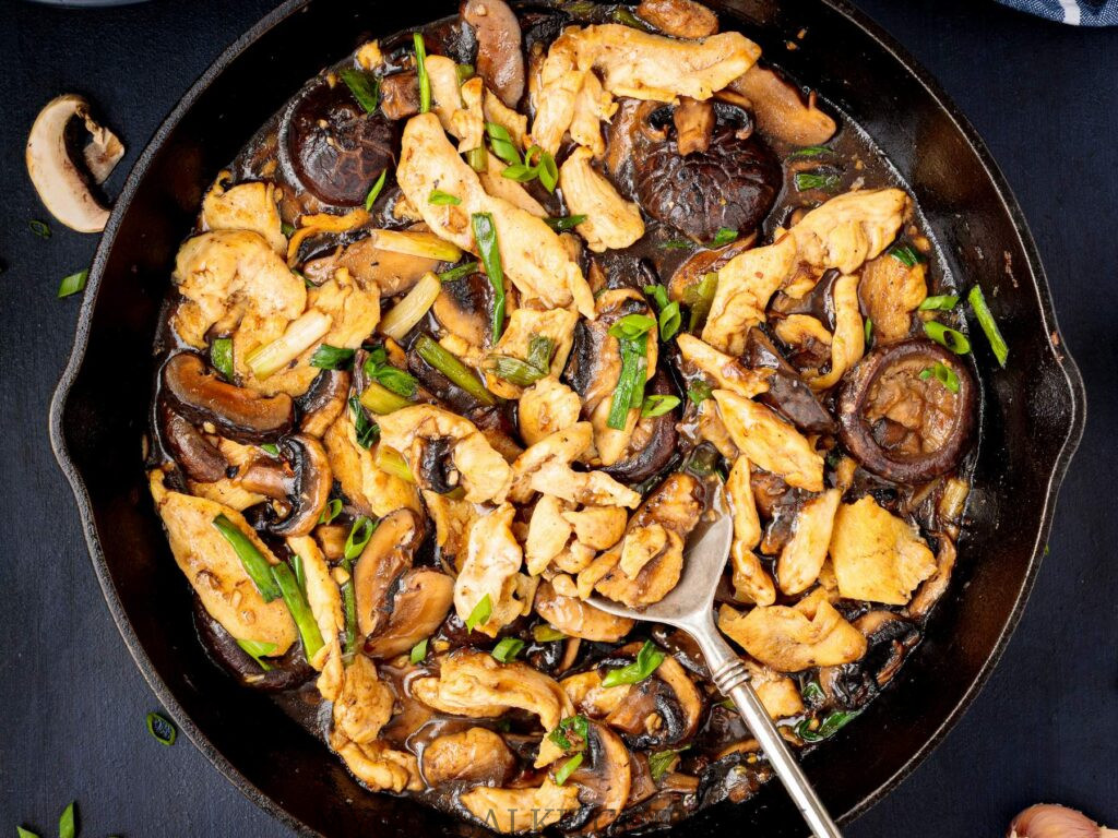 Chinese Chicken and Mushroom Stir Fry or Moo Goo Gai Pan in a skillet