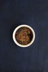 Soy gochujang sauce in a white bowl