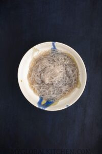 Cooked dangmyeon noodles in a white bowl